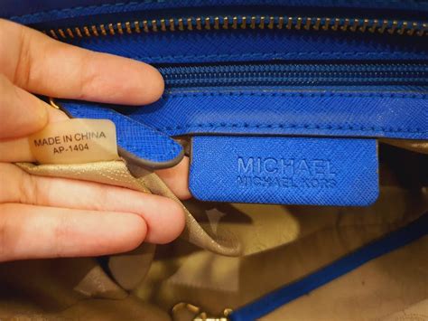 what's in my michael kors bag youtube|Michael Kors purse serial number.